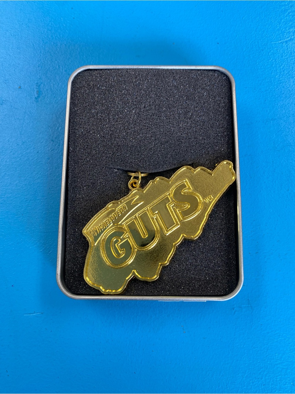 Nickelodeon GUTS Gold Charm Keychain